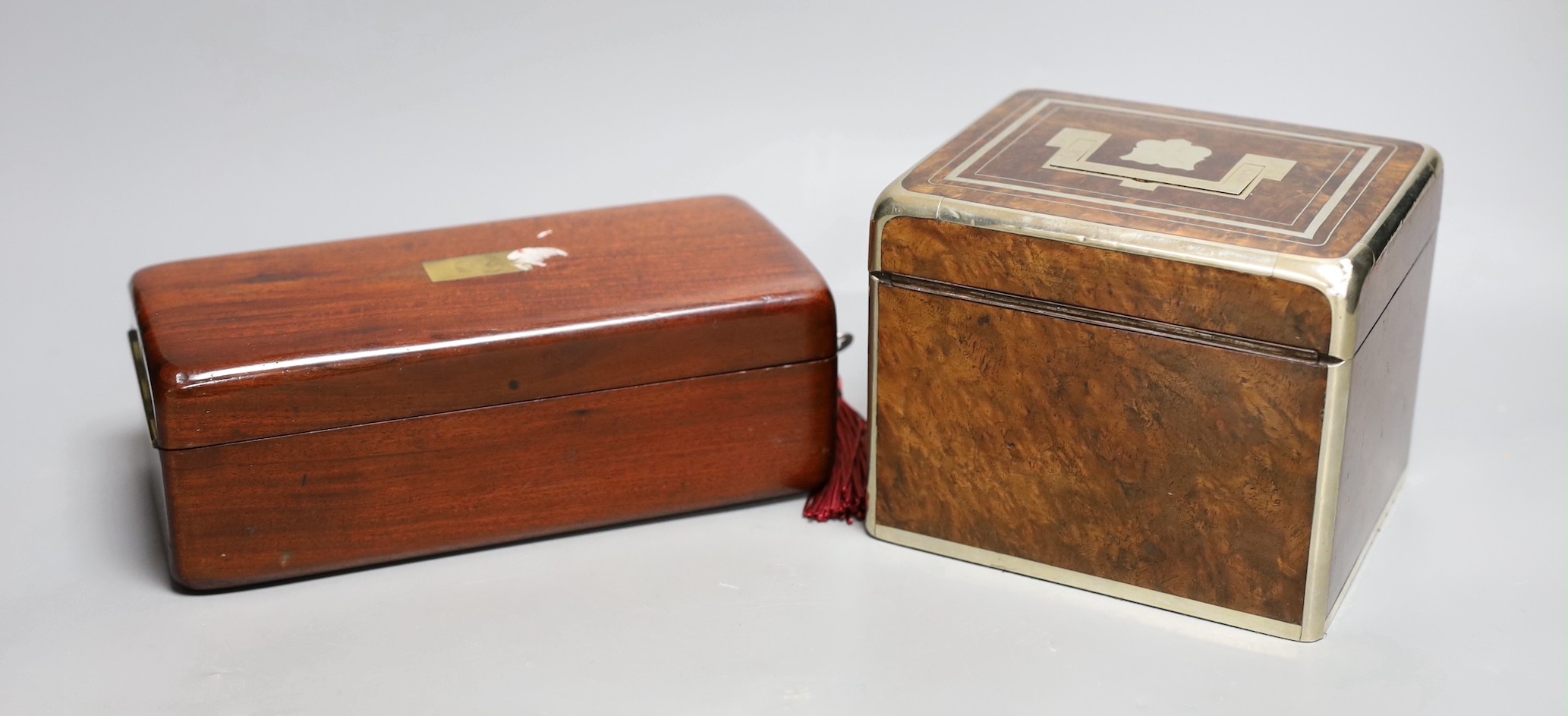 A 19th century Dutch amboyna and brass mounted tea caddy, 14 cm wide and a 19th century French mahogany box by Aucoc Aine a Paris